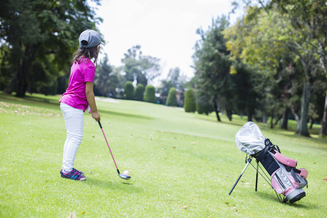 children playing golf