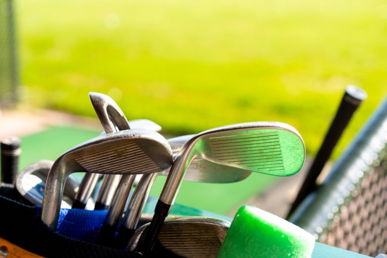 golf-clubs-on-driving-range