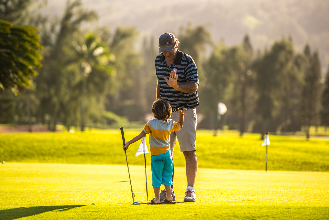 children playing golf